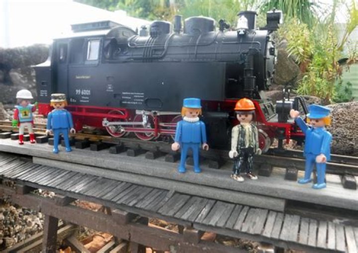 Playmobil in the garden railroad